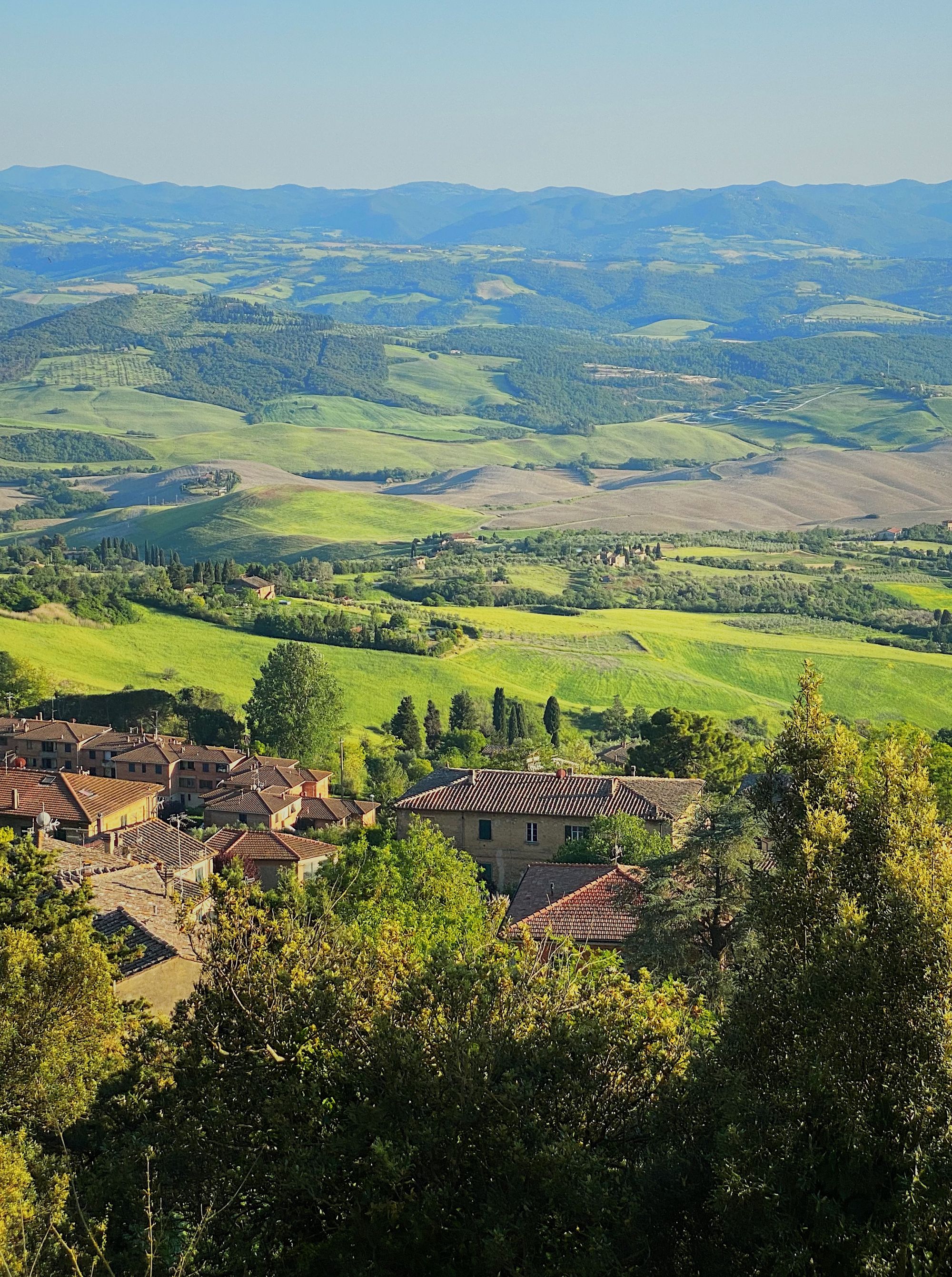 The rolling hills of Tuscany, seen from Volterra, Italy - spring road trip 2022