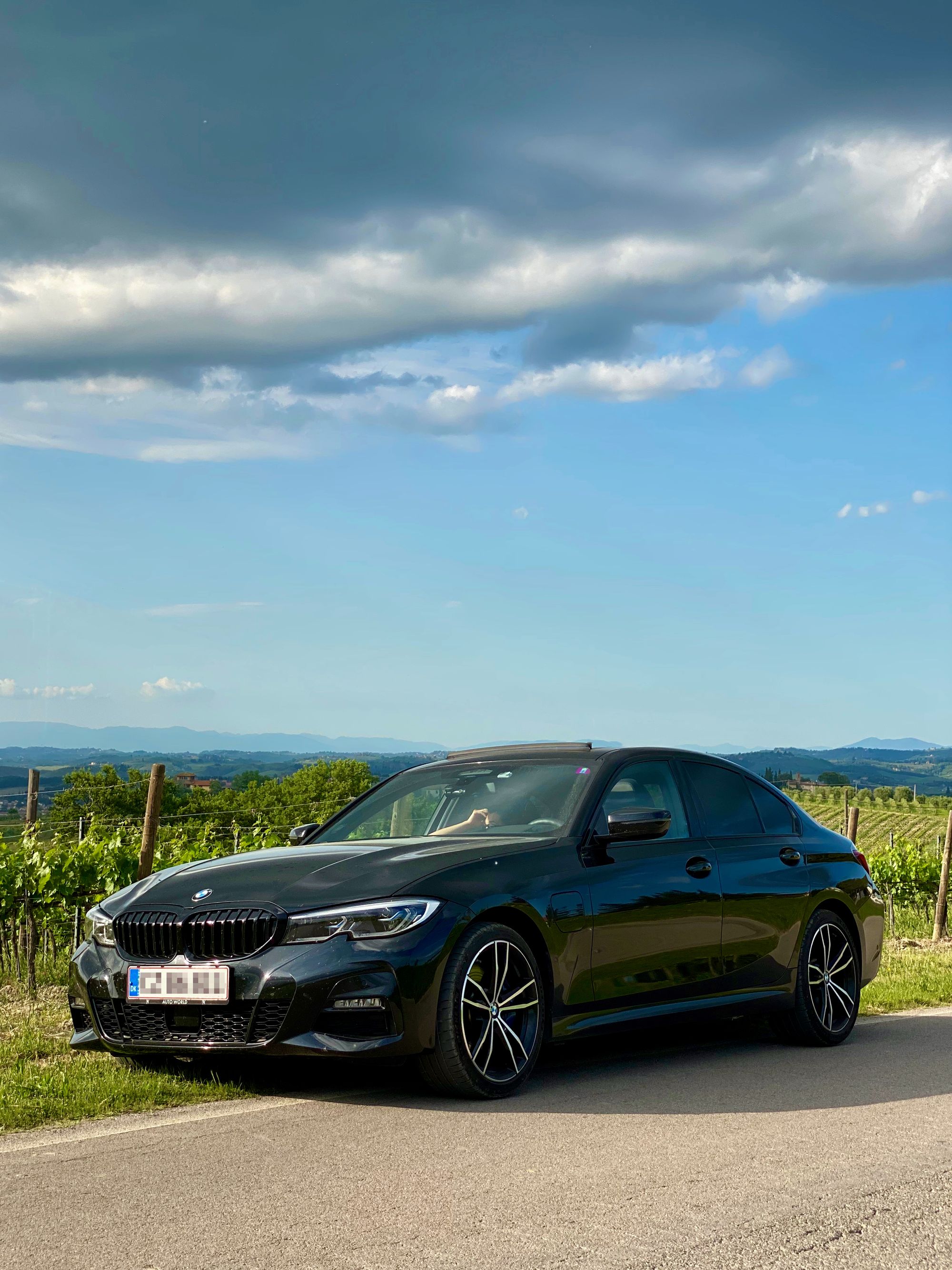 Picture of our car on the road in the italian countryside