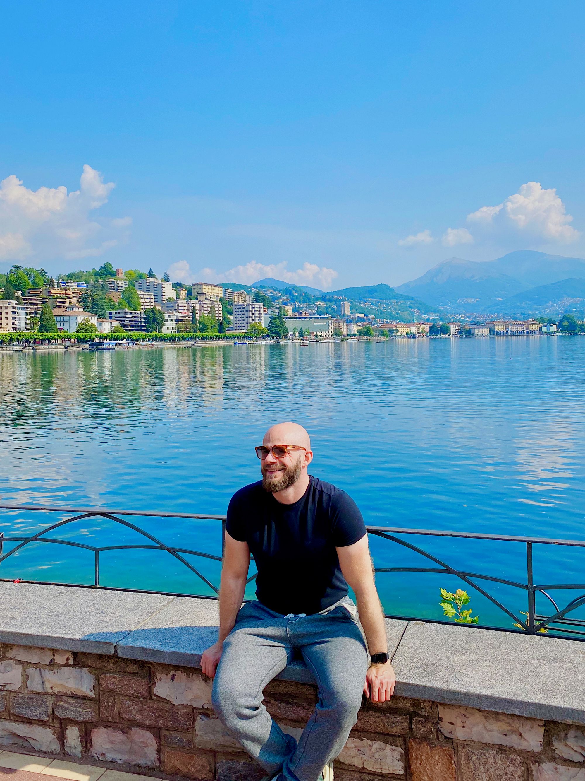 Me sun basking on the shore of Lake Lugano in Switzerland