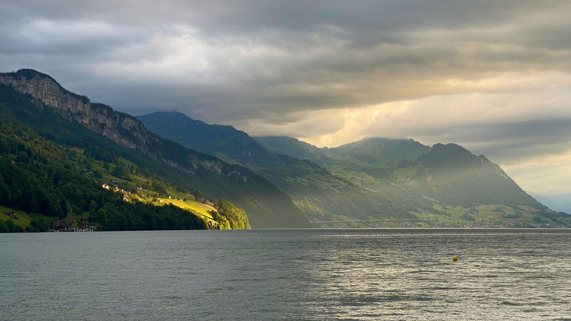 Sunset with godrays over Lake Lucerne seen from Brunnen