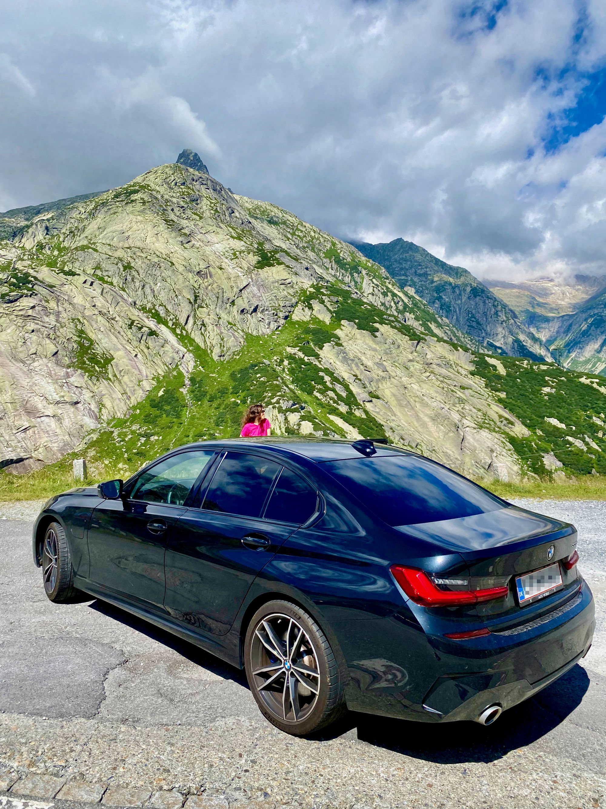 Silvia and our car resting at the Grimsel Pass