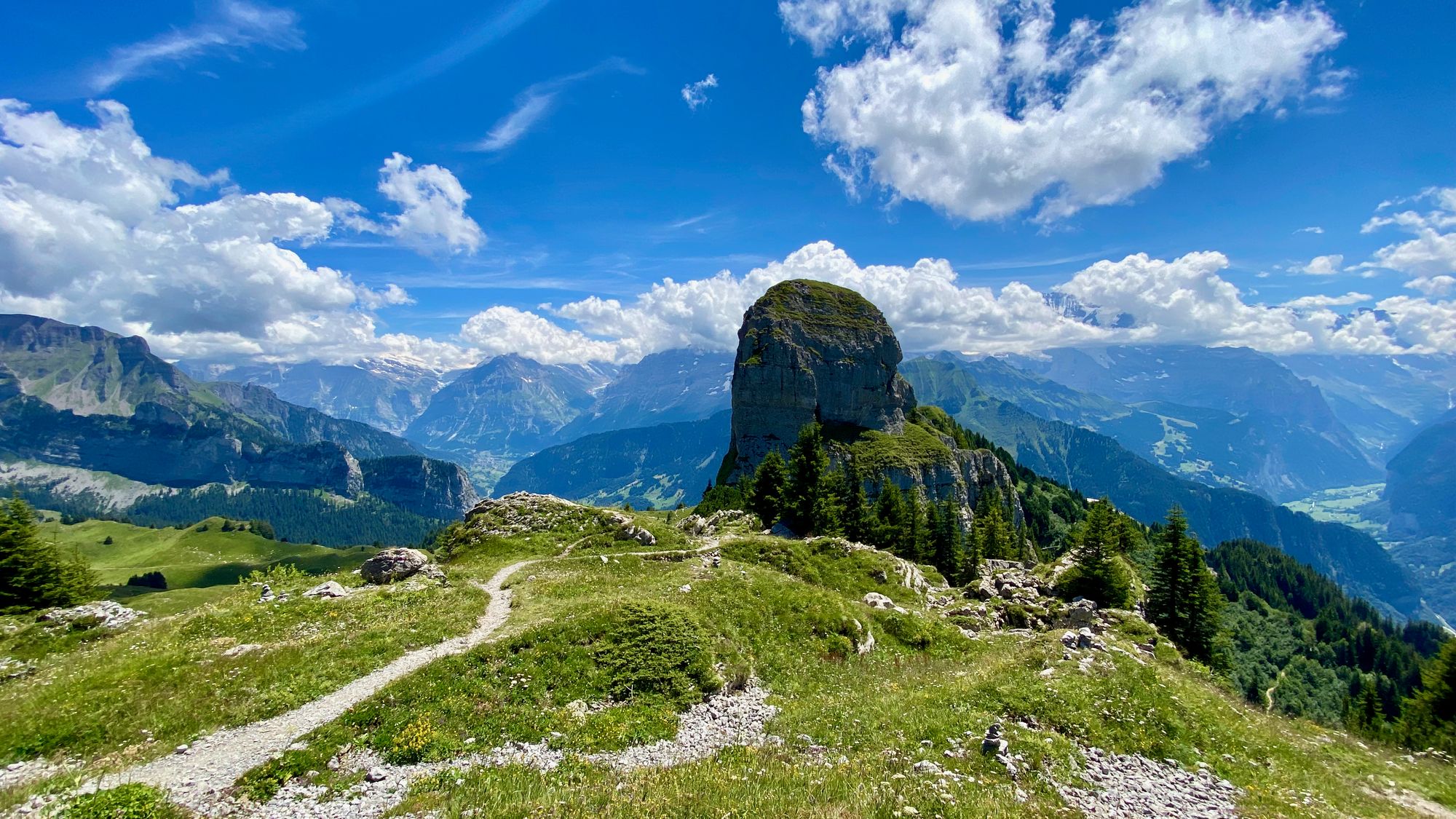 Wide shot over the swiss mountains from Schynige Platte panorama trail